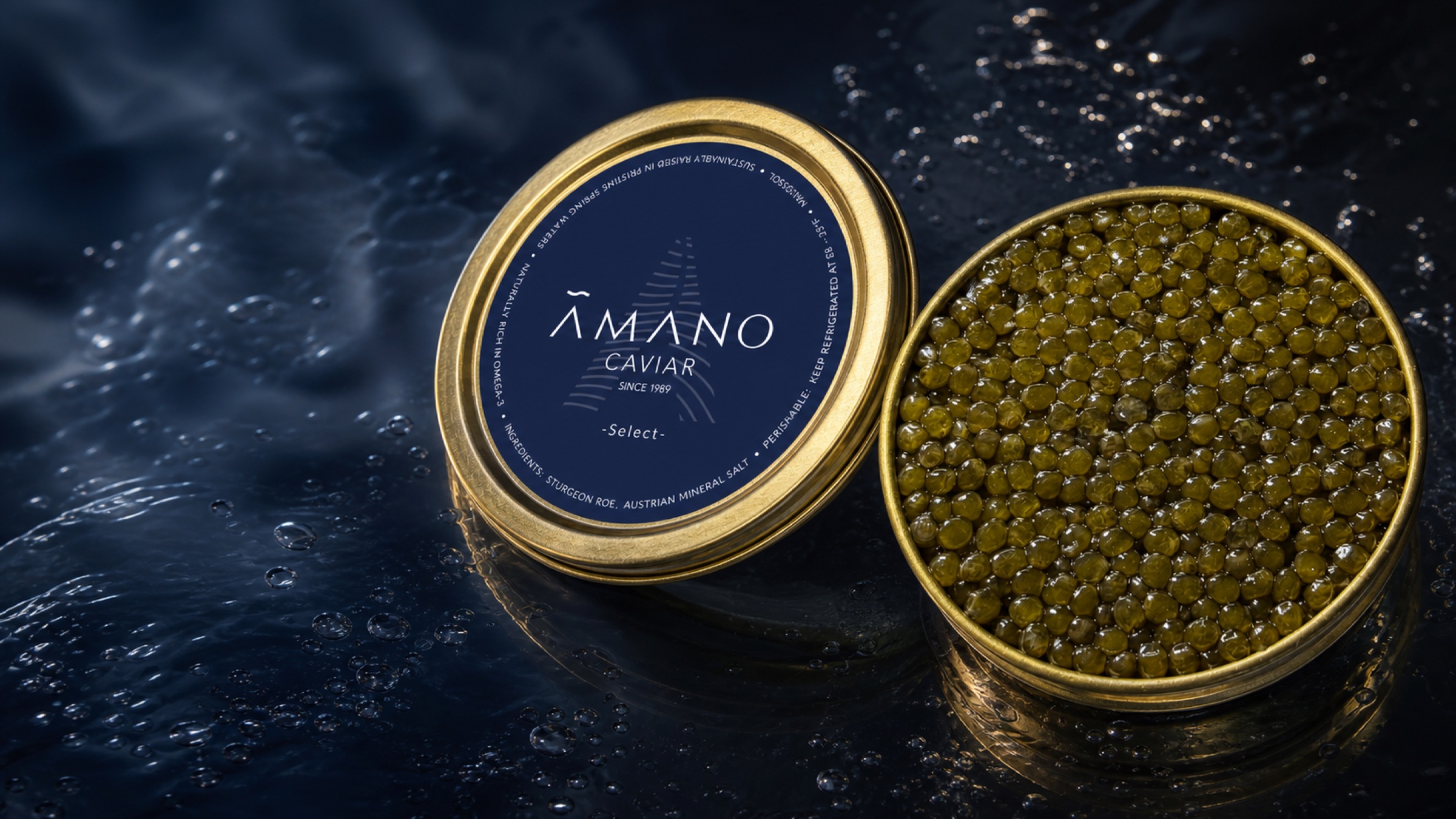 Open AMANO Select caviar tins on a deep-blue water-reflective surface